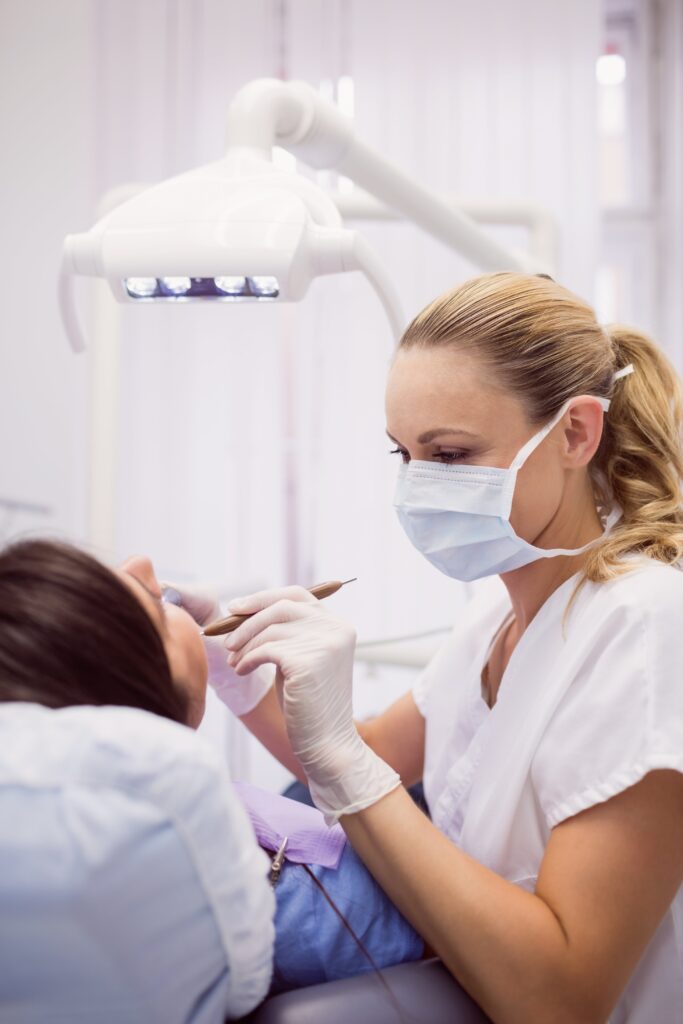 dentist-examining-female-patient (1)